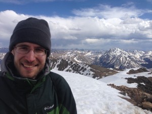 Higher Math Help Owner Greg Stanton Standing Atop Mount Elbert